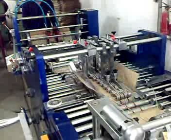 伊寧國標(biāo)品質(zhì)塑料制品 手機貼膜紙卡、紙袋與包裝盒制造機器一站式解決方案